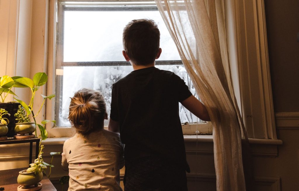 children enjoying a view of snow. calculated using snow day predictor